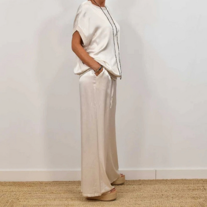 Nerea | Conjunto de top y pantalón palazzo en crema satinado