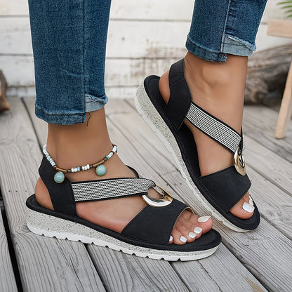 Lola | Sandalia plana con tira elástica y detalle dorado