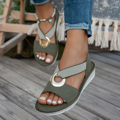 Lola | Sandalia plana con tira elástica y detalle dorado