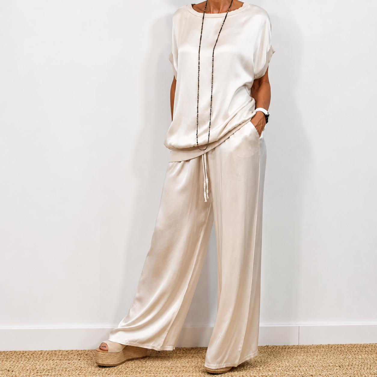 Nerea | Conjunto de top y pantalón palazzo en crema satinado