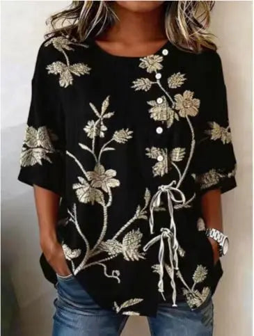 Flor | Blusa con bordado floral en relieve y lazada lateral