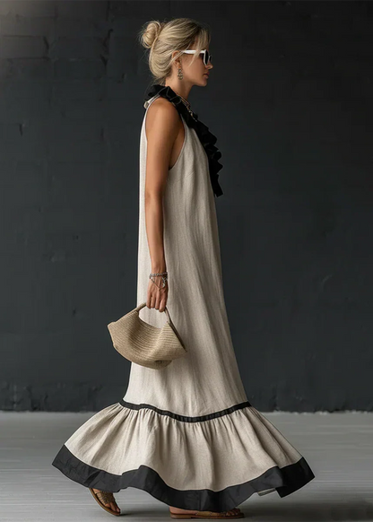 Vestido largo de mujer con volantes y cuello halter