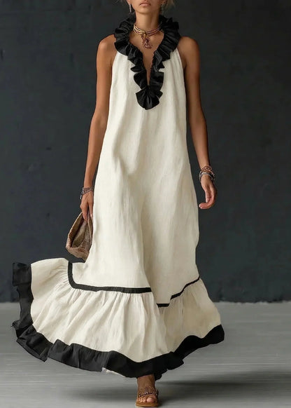 Vestido largo de mujer con volantes y cuello halter