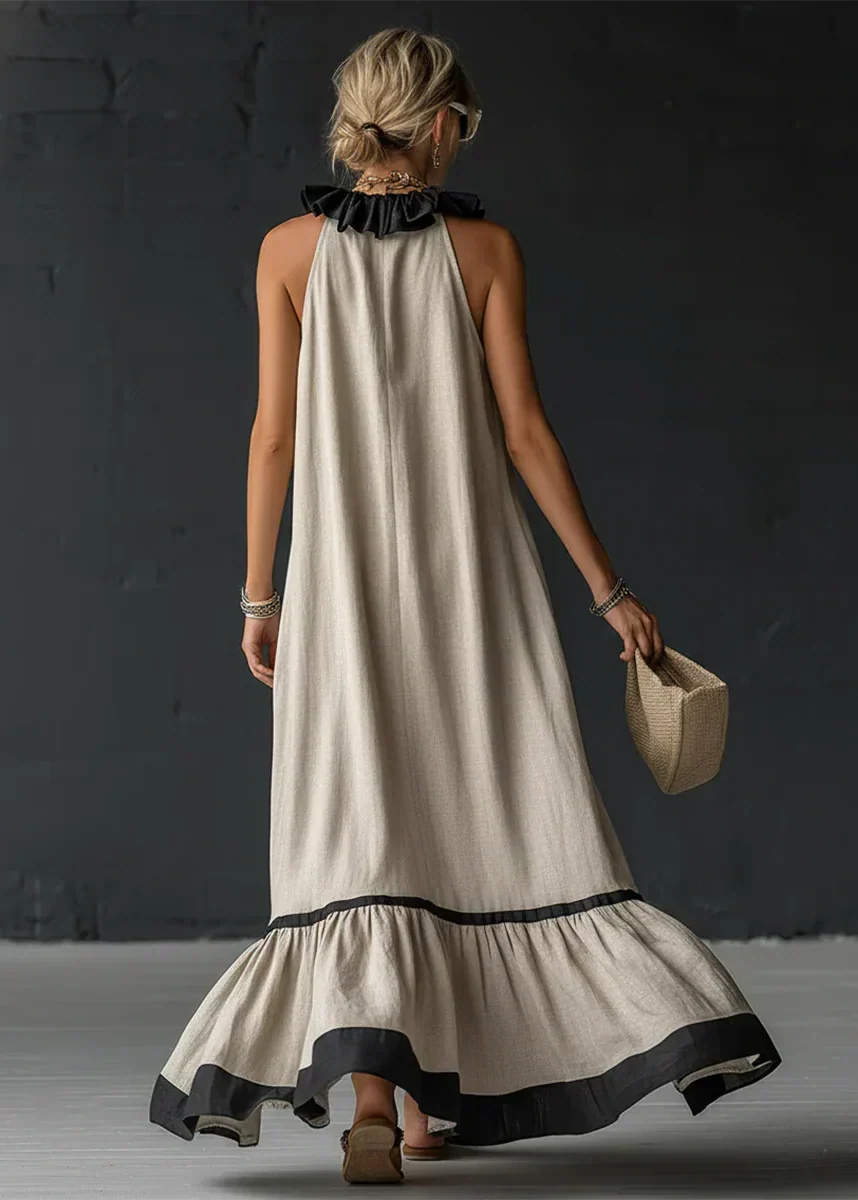 Vestido largo de mujer con volantes y cuello halter